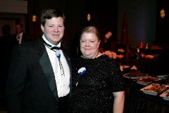 Bill Powers and his wife Rhonda at the 2004 Cotton Bowl Chairman's Ball. Powers worked 22 consecutive Cotton Bowl football games, serving as the head of the statistics team his last 12.